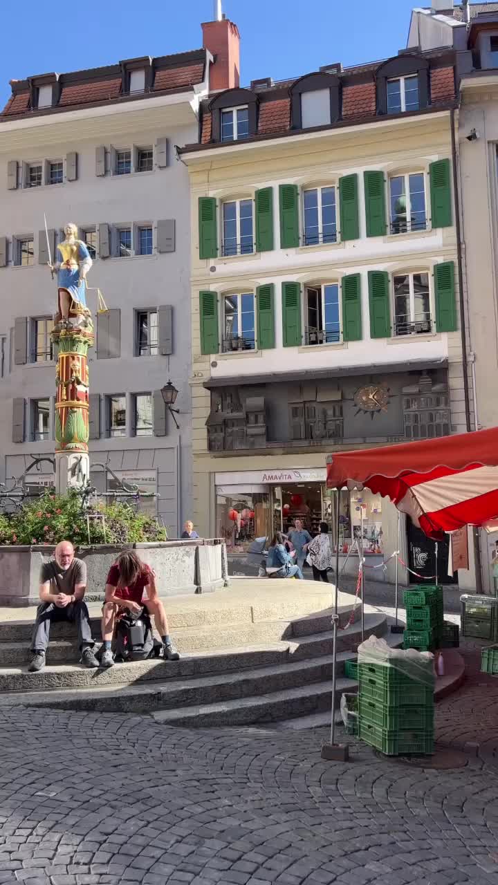 Place de la Palud (old town square & clock)